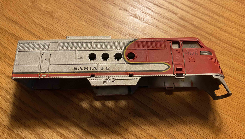 old model locomotive shell on wood table