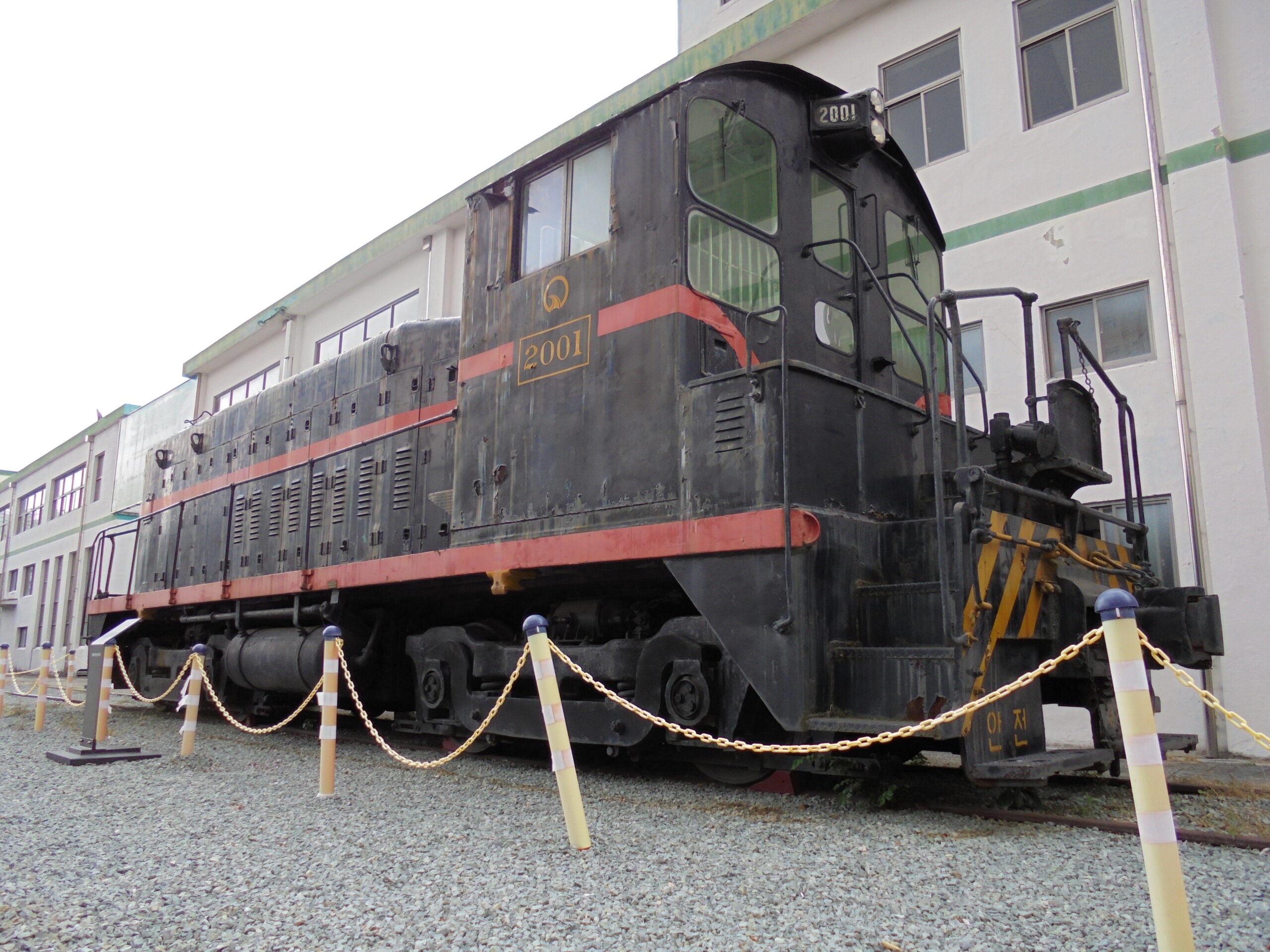 grey and red locomotive relic
