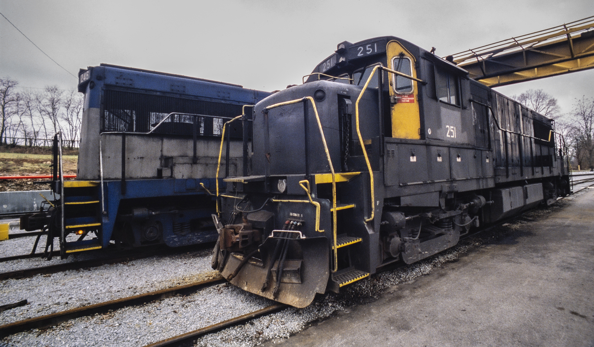 black locomotive with yellow door