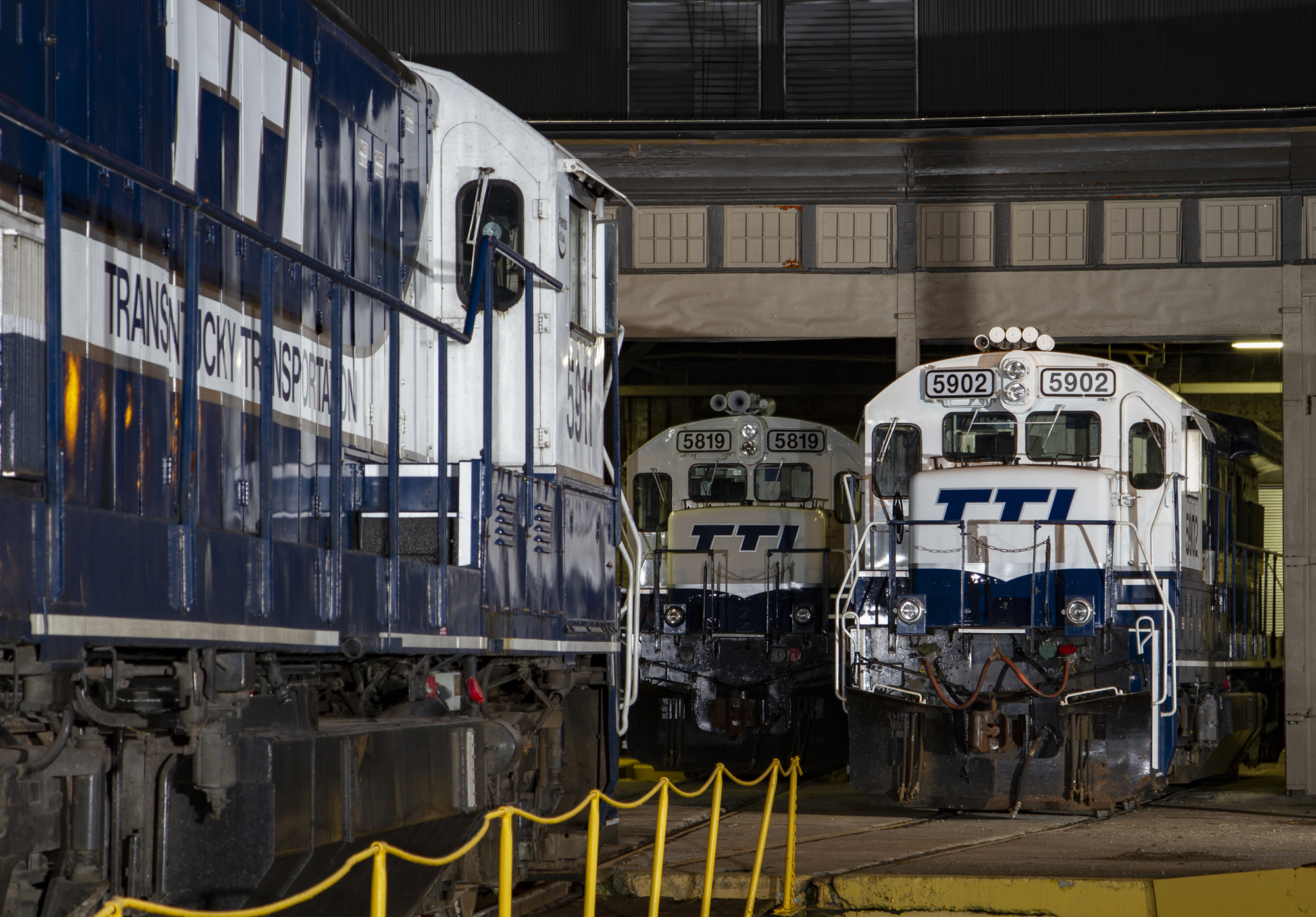 three locomotives parked