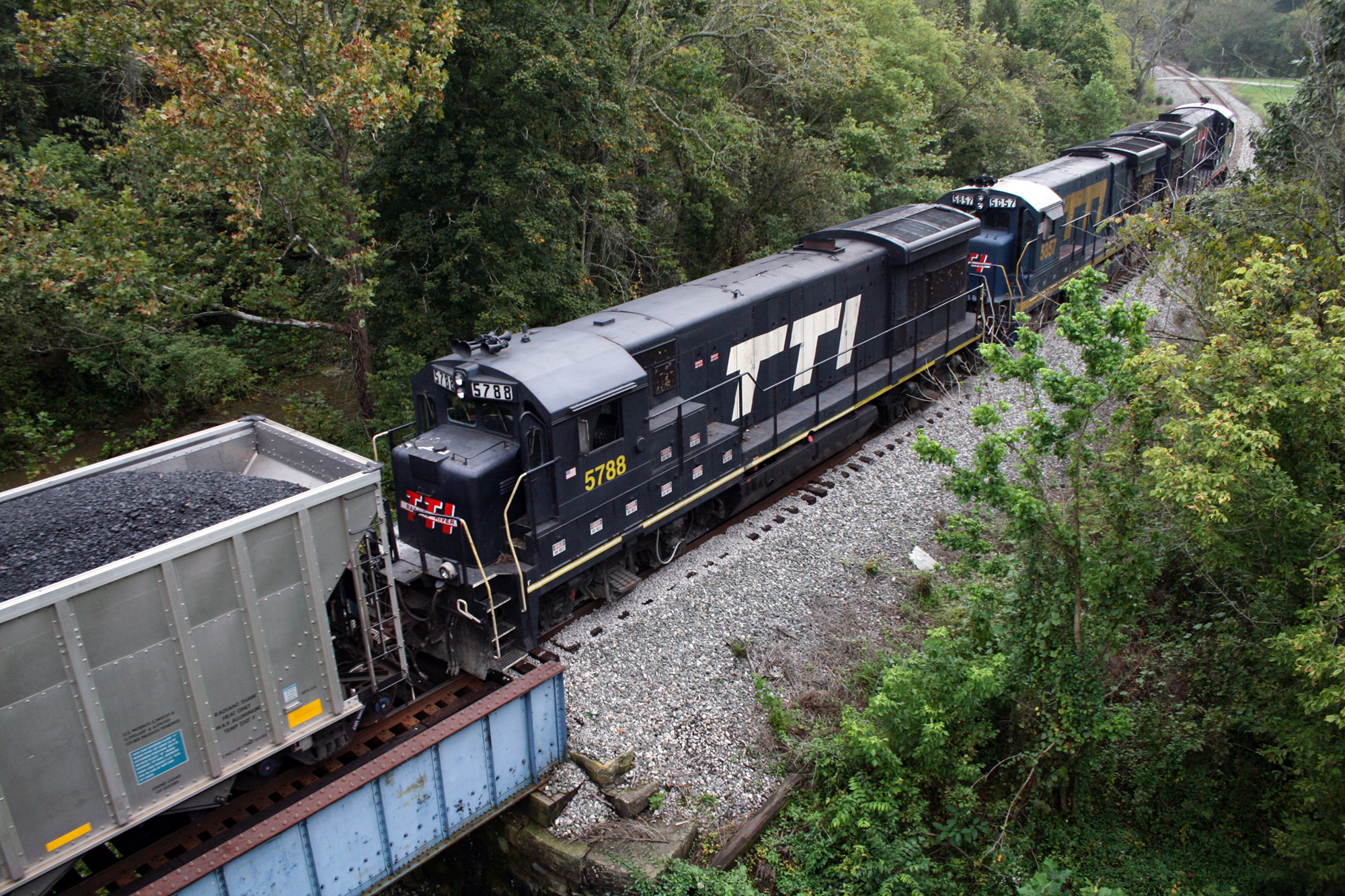 dark blue train hauling coal
