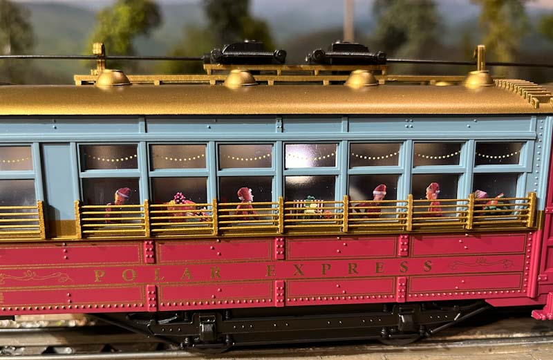 Lionel Polar Express trolley elves int he windows