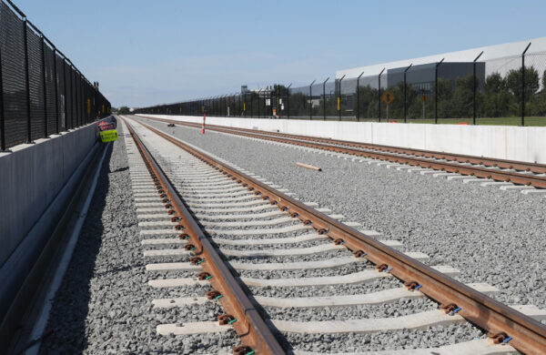 Why do some railroads use concrete ties versus wood ties?