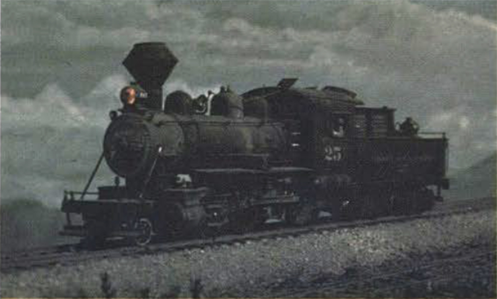 John Allen’s Locomotive Weathering Secrets: A black and white photo of a heavily weathered model steam locomotive with bell smokestack