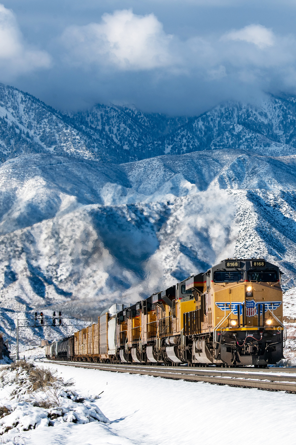 UP freight train with mountains