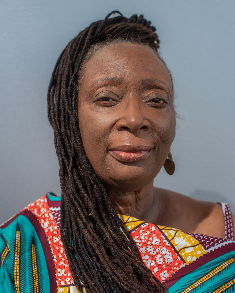 Head shot of woman with braided hair