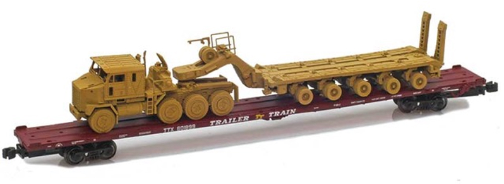 An image of a model flat car with truck