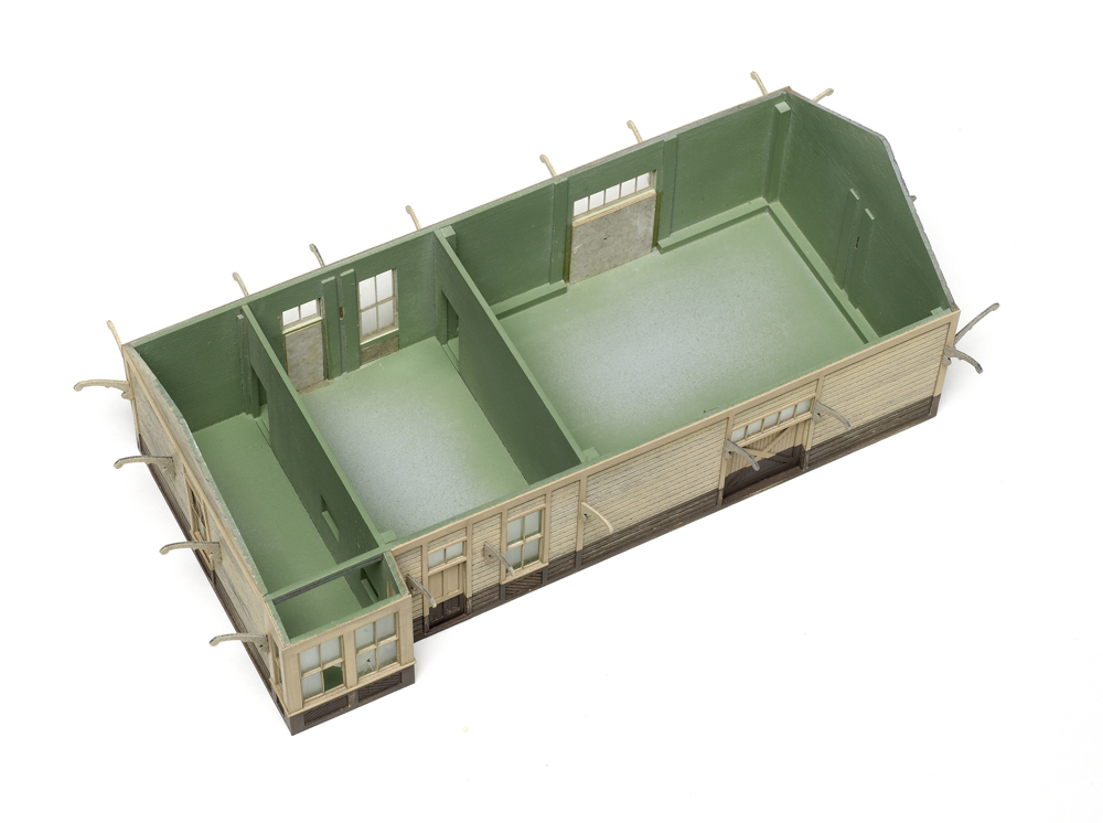 An image of a model structure with the roof removed.