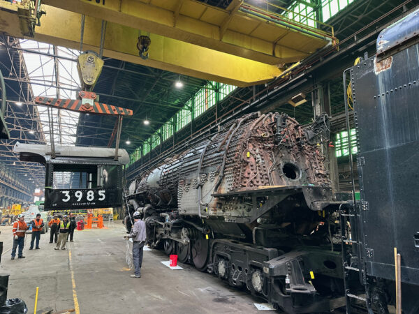 Locomotive in shop. CB&Q turntable to be installed at Silvis shop.