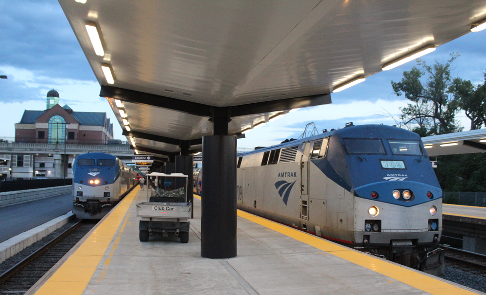 Two trains on opposite sides of station platform