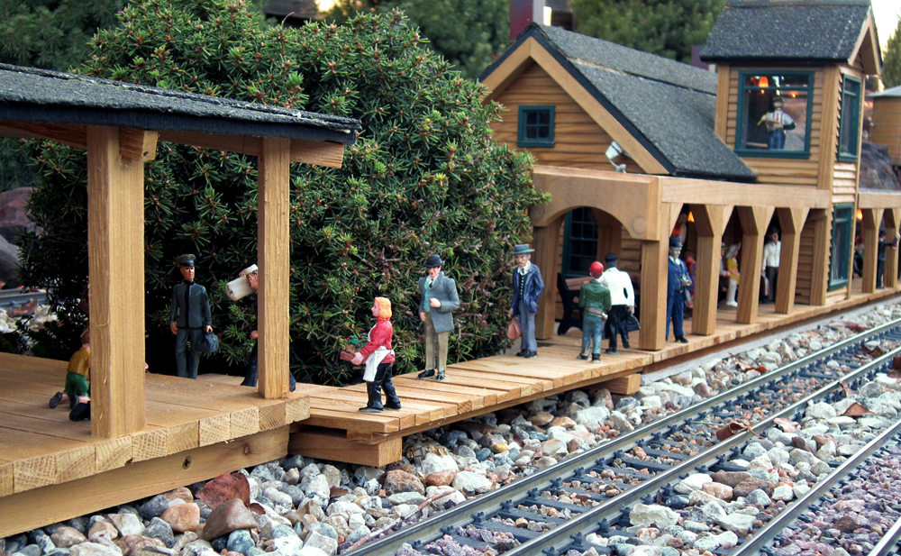 wood depot with model people