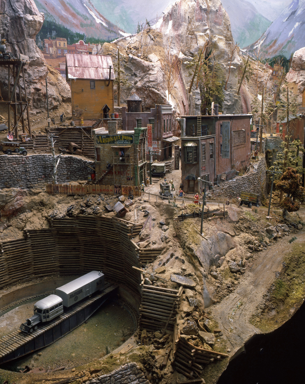 Color photo of town scene on model railroad.