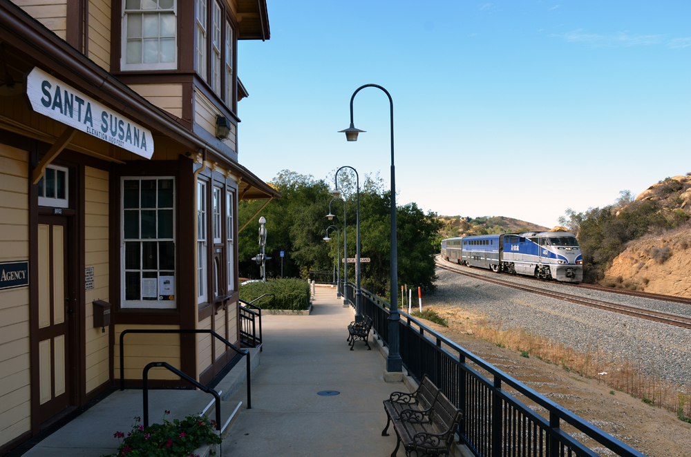 side view of depot with train in background
