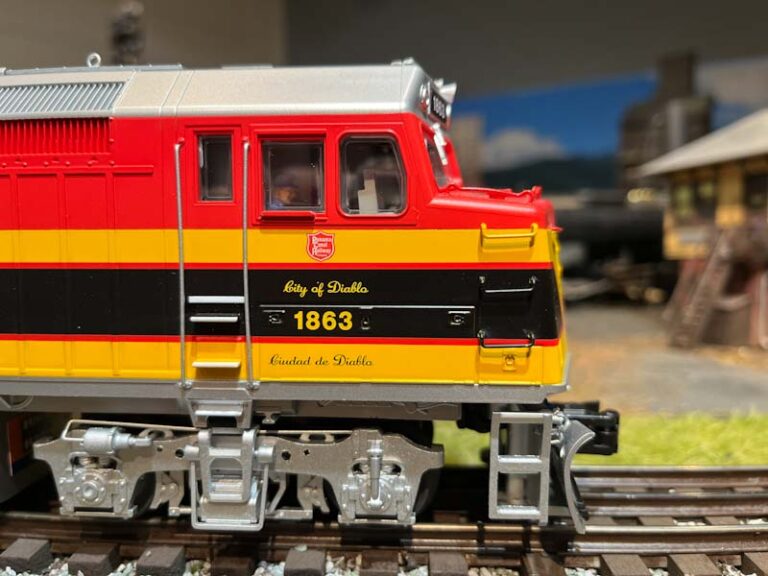 Crew figures in the cab of the Lionel F40PH