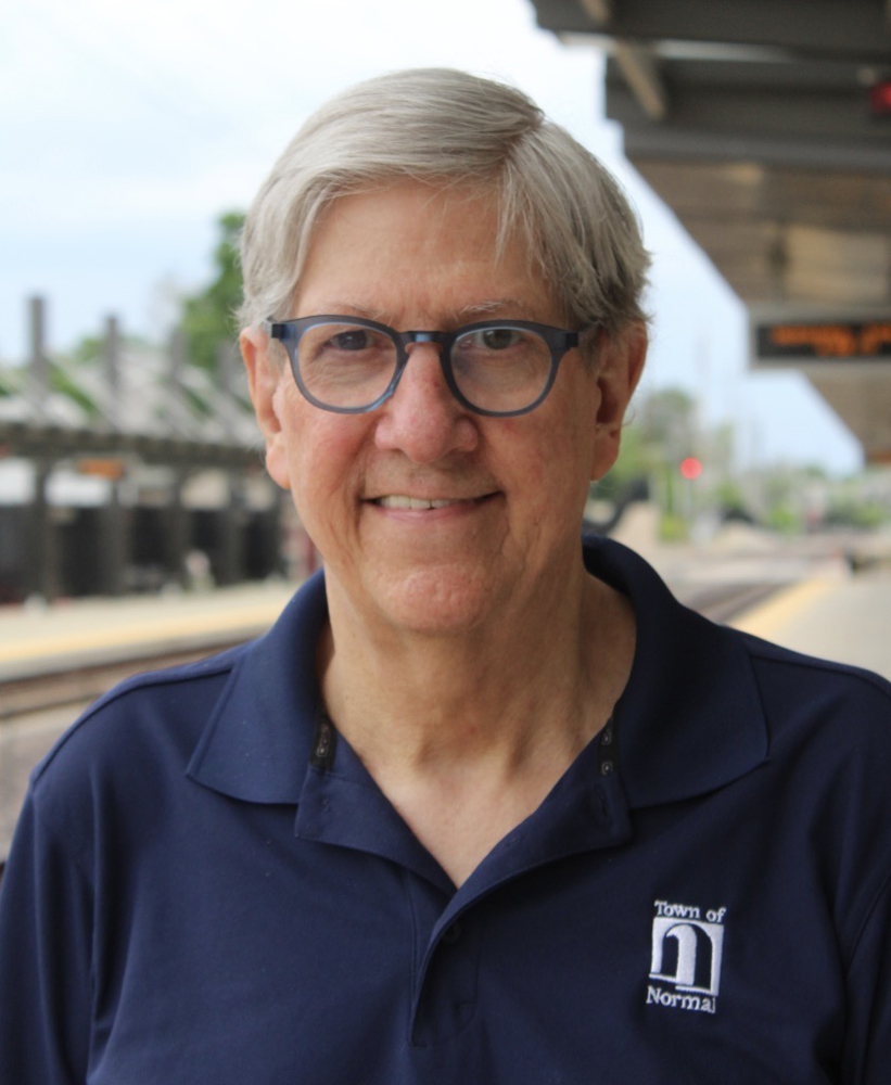 Head shot of man wearing polo shirt for town of Normal, Ill.