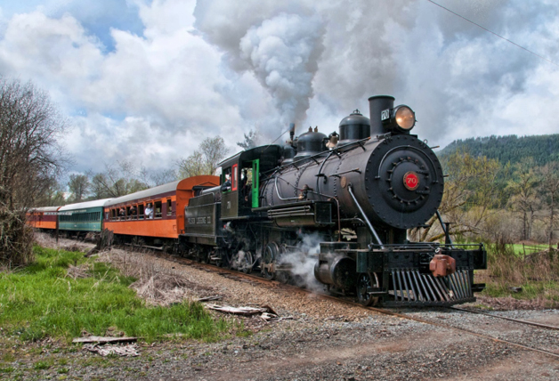 Mt. Rainier Scenic Railroad returns to operation. Steam locomotive with passenger cars