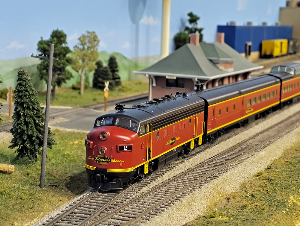 How to build your first transition era train: A model passenger train sits at a station