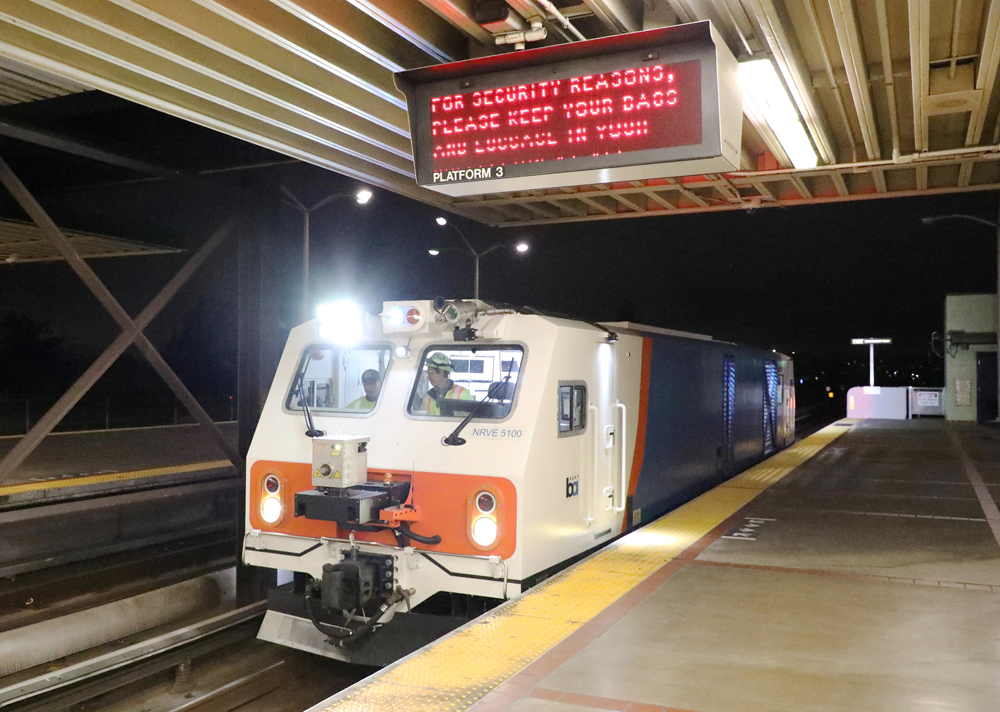 Track geometry car in rapid-transit station