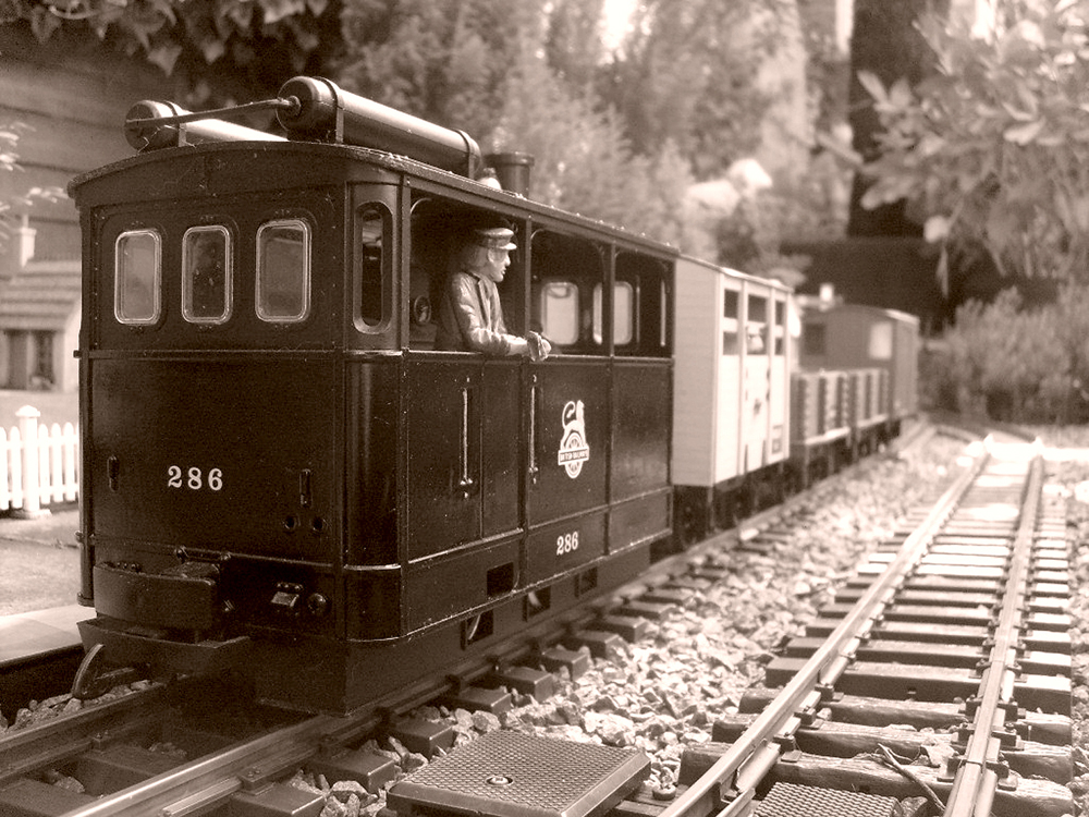 vintage looking photo of model tram locomotive