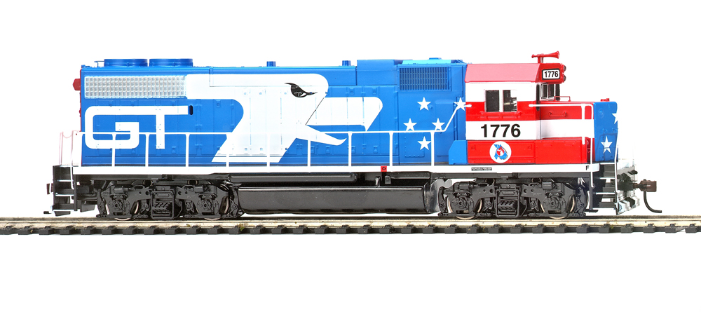 Photo of HO scale diesel locomotive on white background.