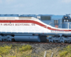 Color image of HO scale six-axle road locomotive on scenic base.