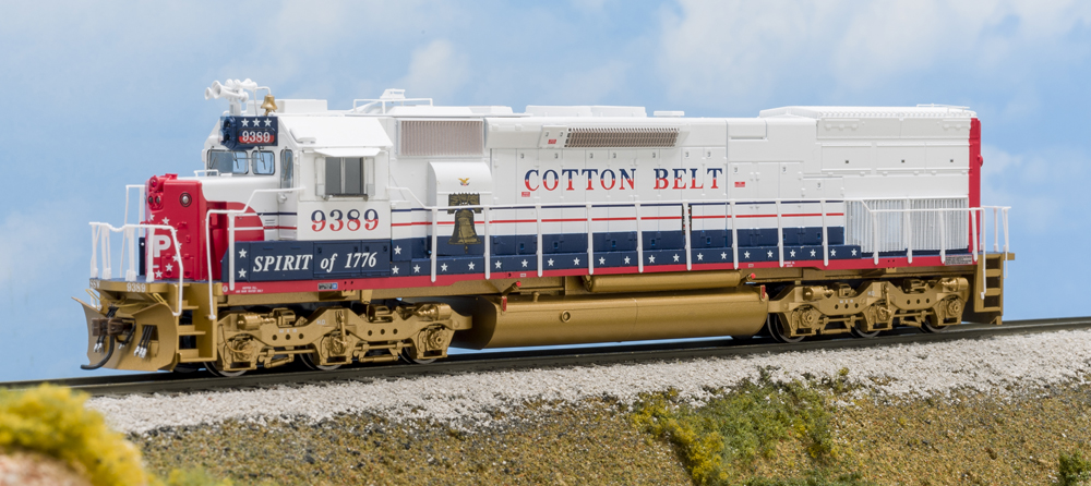Color photo of HO scale road locomotive on scenic base.