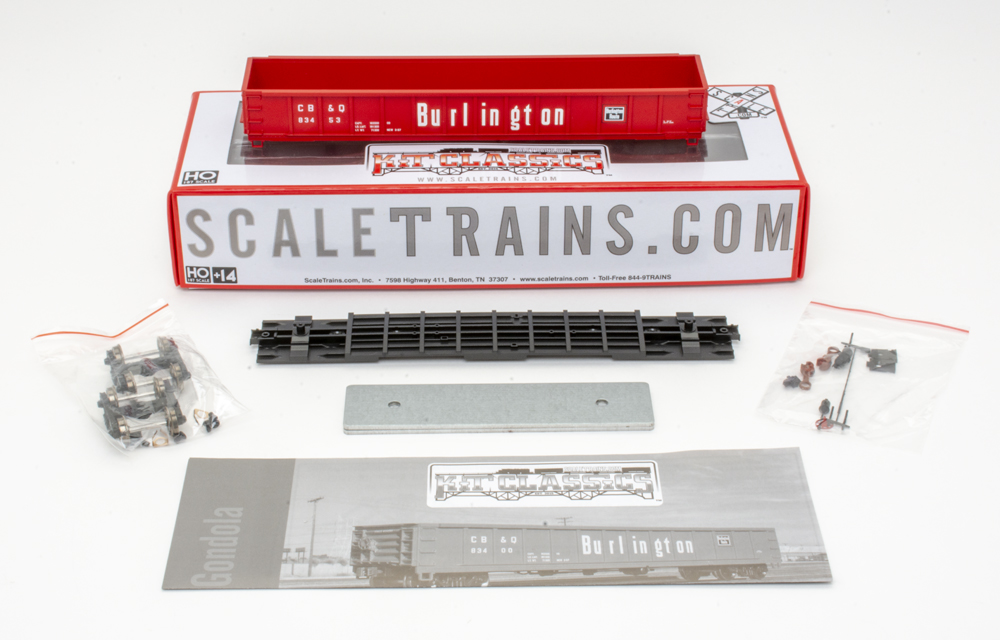Color photo of HO scale gondola kit components.