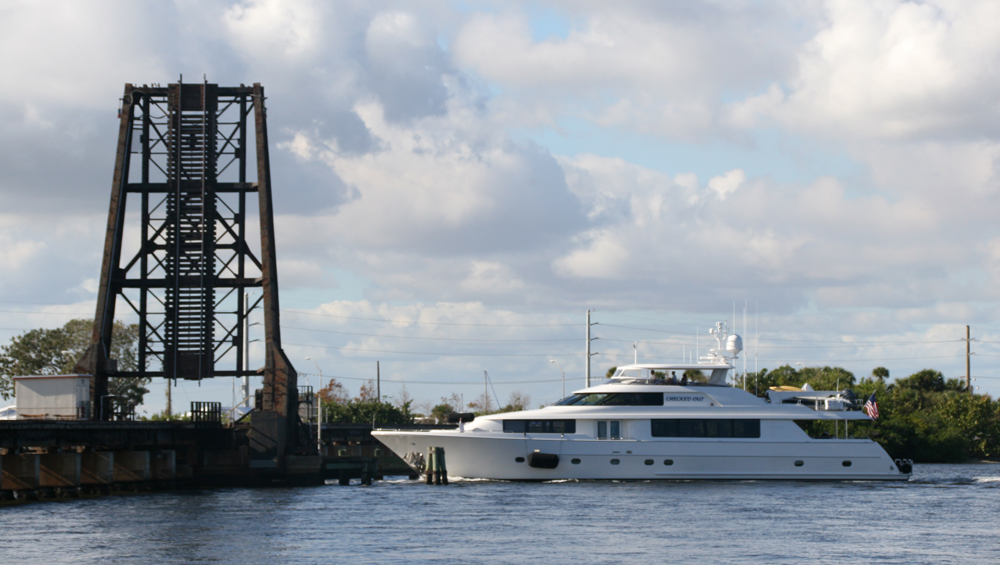 Boat approaches open drawbridge