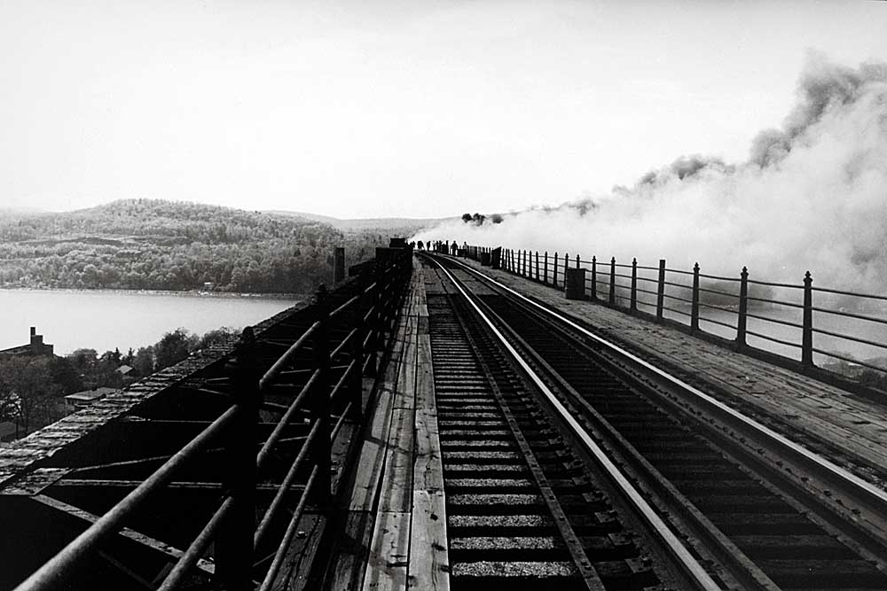 Firefighters fight a fire on a bridge that would become the Walkway Over the Hudson
