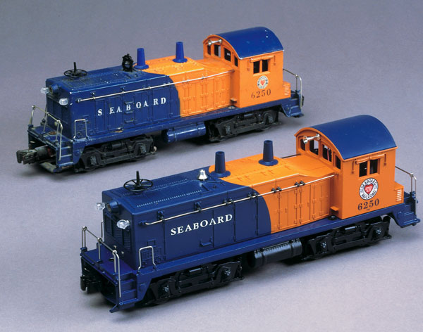 5 small toy train engines Lionel NW2