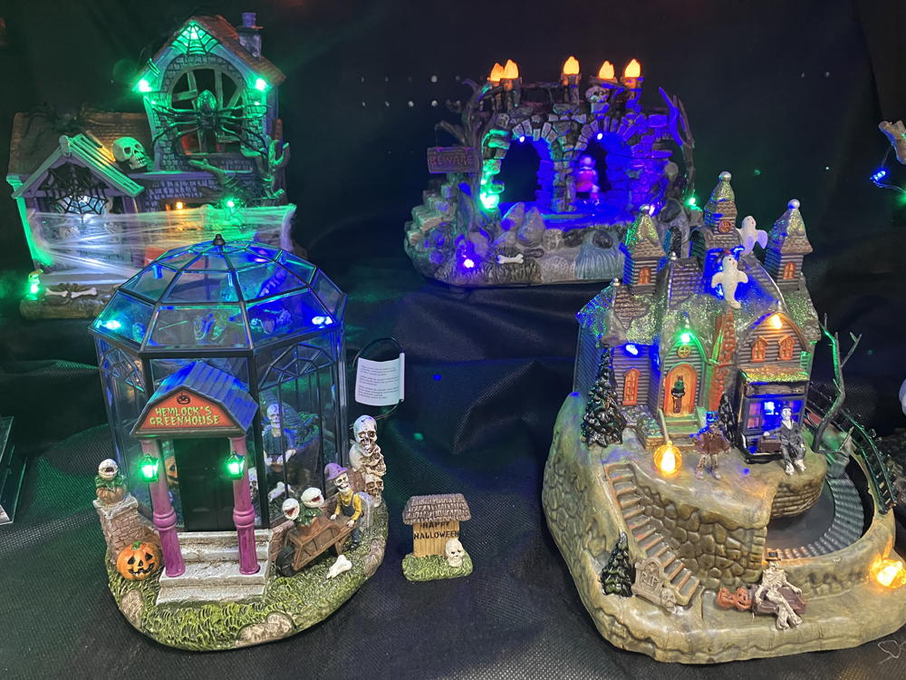 four Halloween structures on display