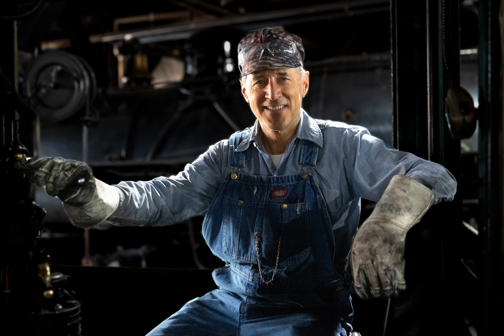 man in cab of locomotive