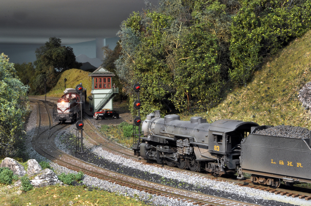 model steam engine on curve on train layout