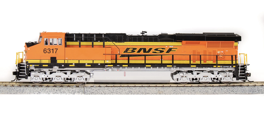 A model locomotive in an orange paint scheme