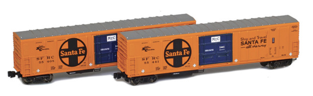 An image of two model freight cars in orange