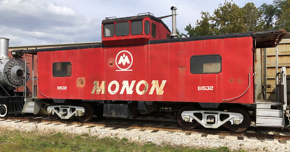 Red caboose with extended cupola