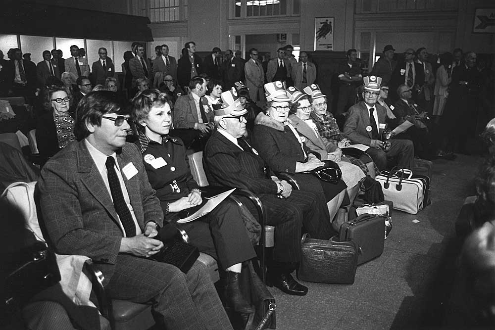 People inside Amtrak Twin Cities services passenger train waiting room