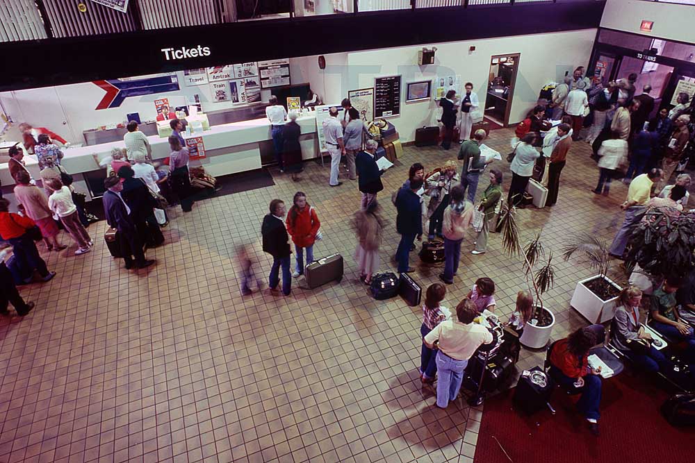 People inside Amtrak Twin Cities services passenger train waiting room