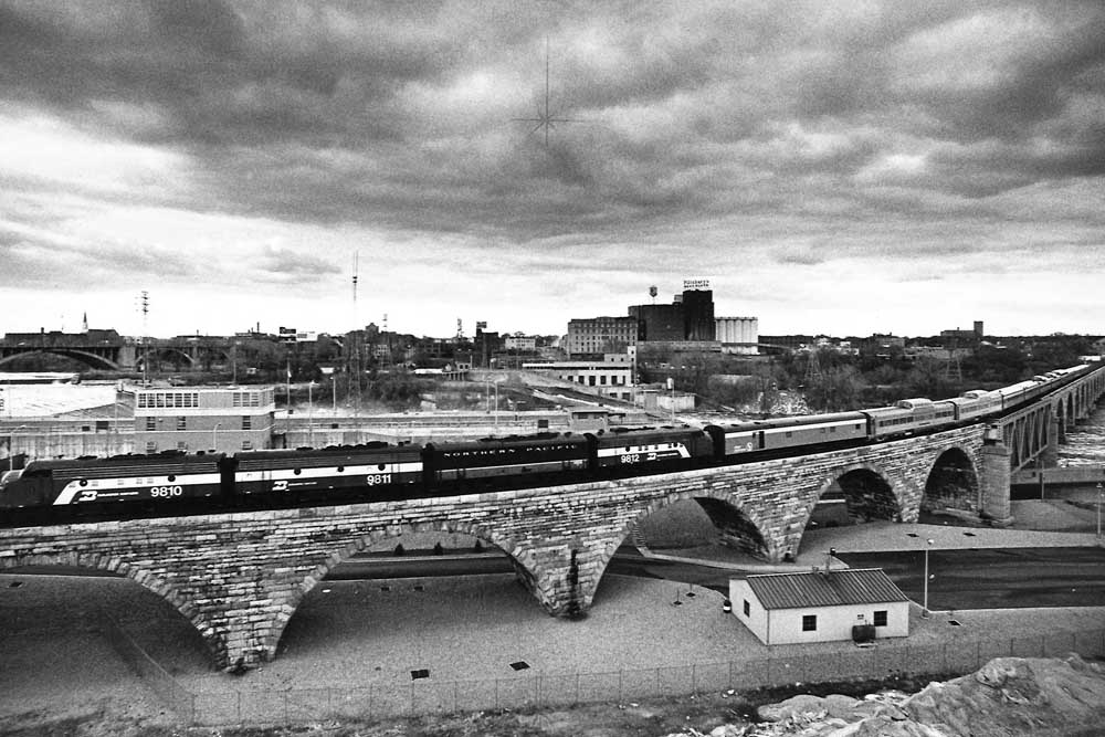 Amtrak Twin Cities services passenger train on bridge
