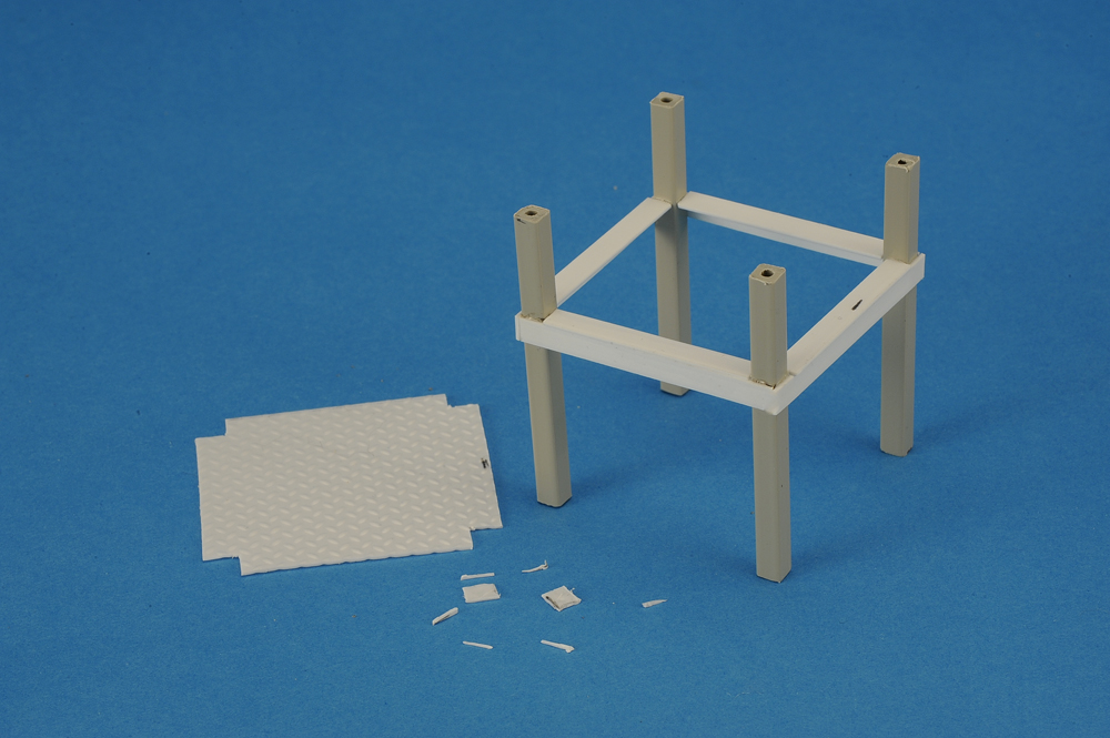 plastic pieces on blue background