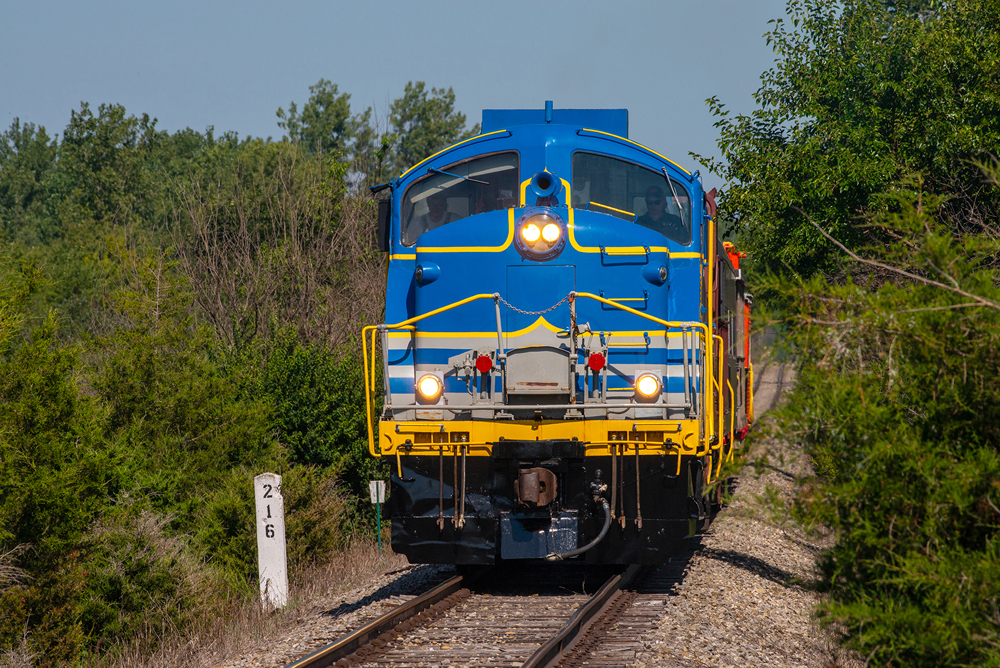 blue, yellow, and gray engine