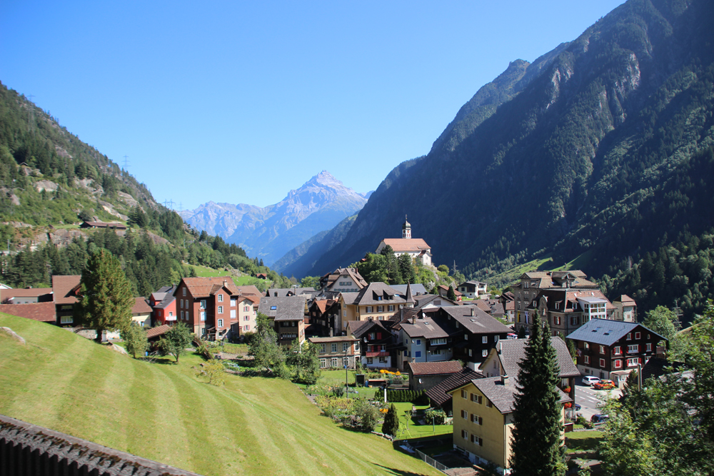 Small town in a valley with church in center