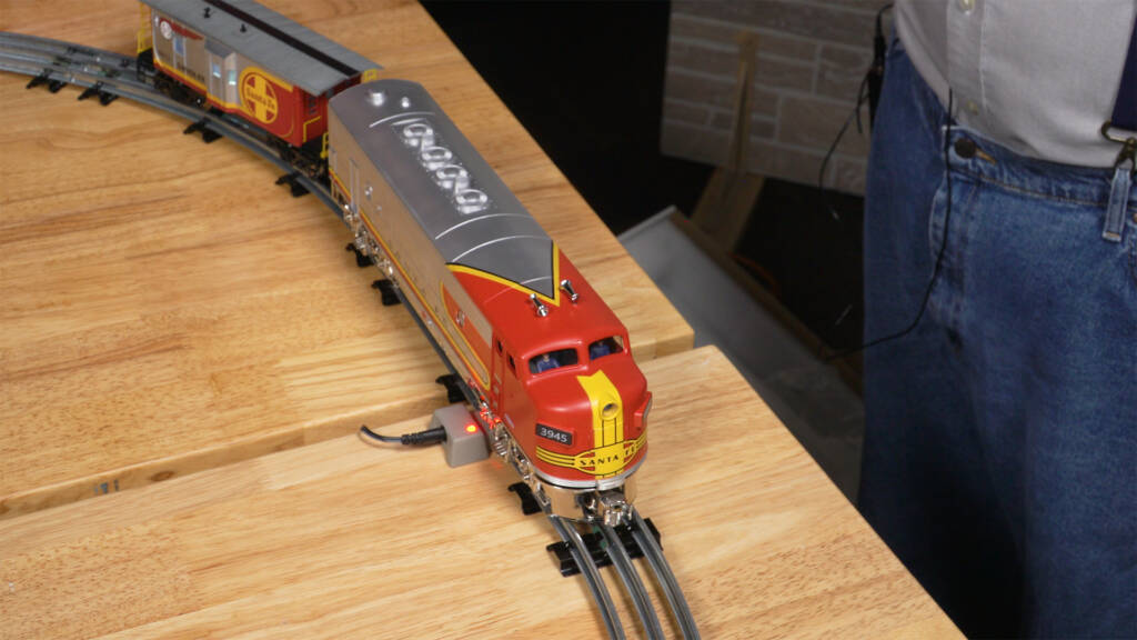 red and silver engine on table