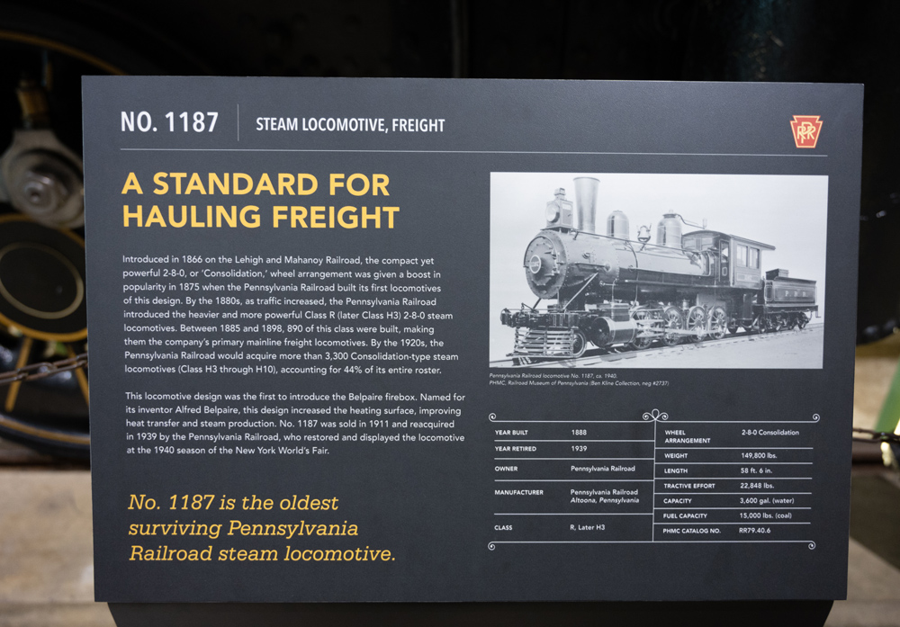 black plaque with text on train