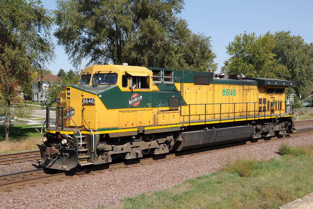 Yellow-and-green Chicago & North Western locomotives without a train