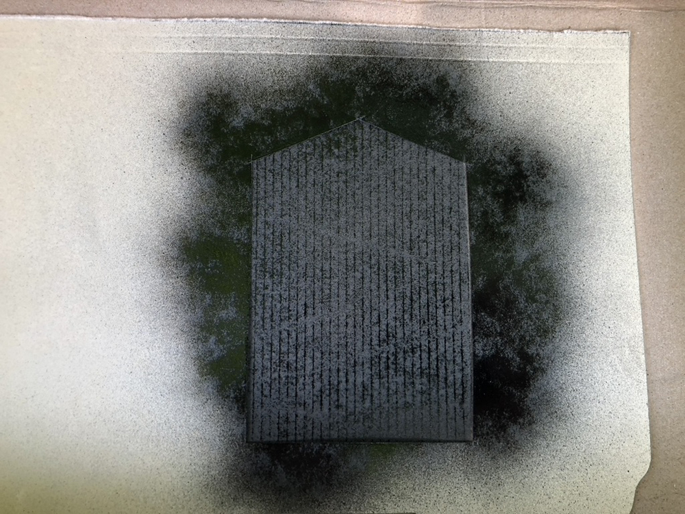 cardstock template with center spraypainted black