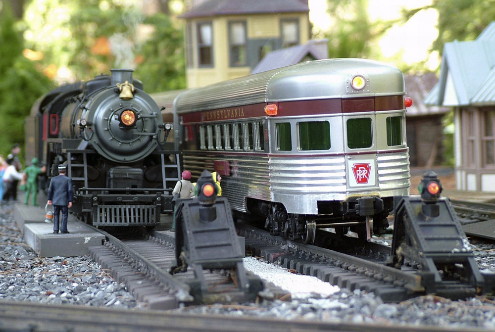 close up of silver model trains