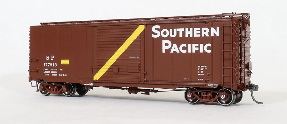 A model freight car in a red paint scheme