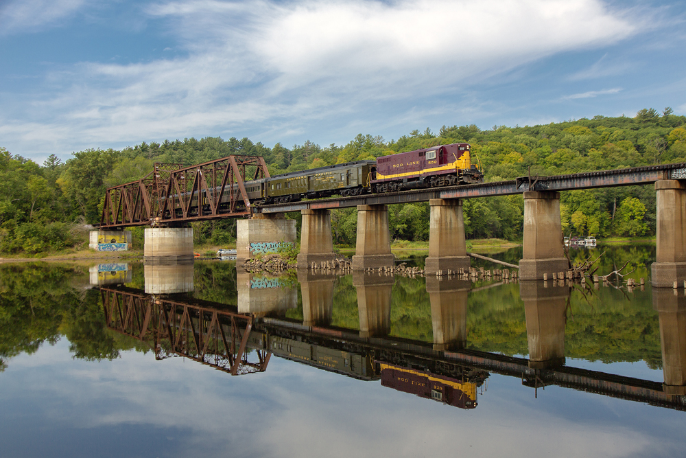 red Soo Line diesel on bridge over water