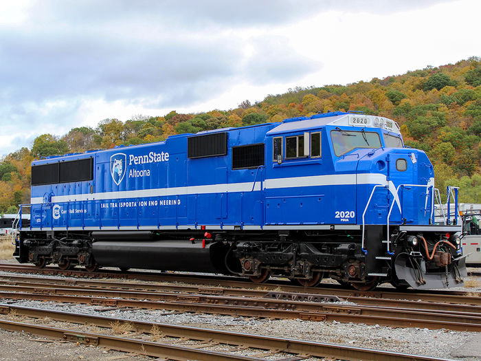 Three-quarters view of blue diesel with white trim